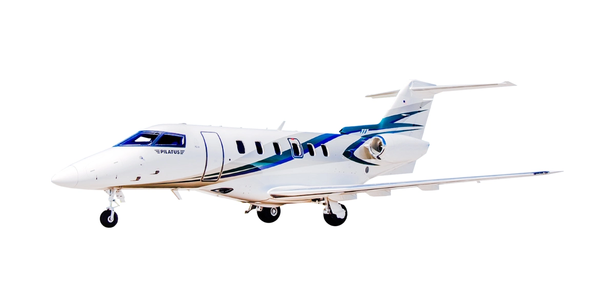 A Latitude 33 Aviation 2018 Pilatus PC model private jet side profile with a white background.