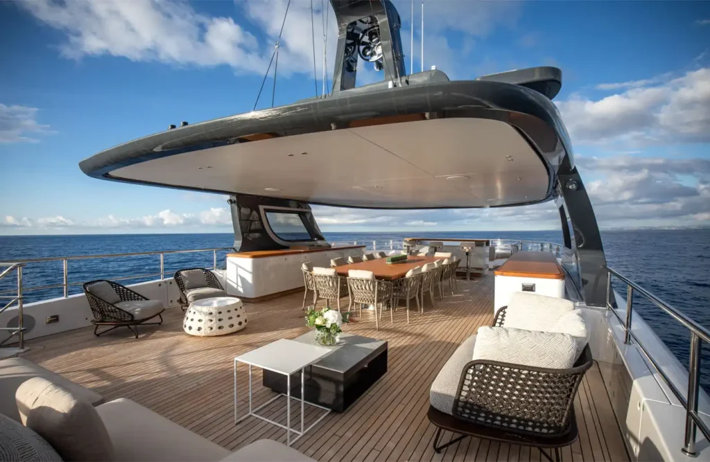 Cada Dia’s upper deck offers alfresco dining, stylish lounge seating, and uninterrupted sea views in a refined setting built for entertaining outdoors.